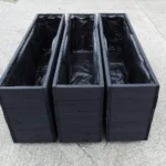 black wooden flower planter